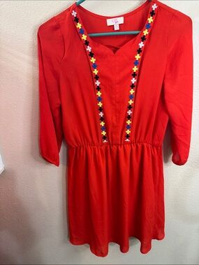 GB girls red top with pink logo label